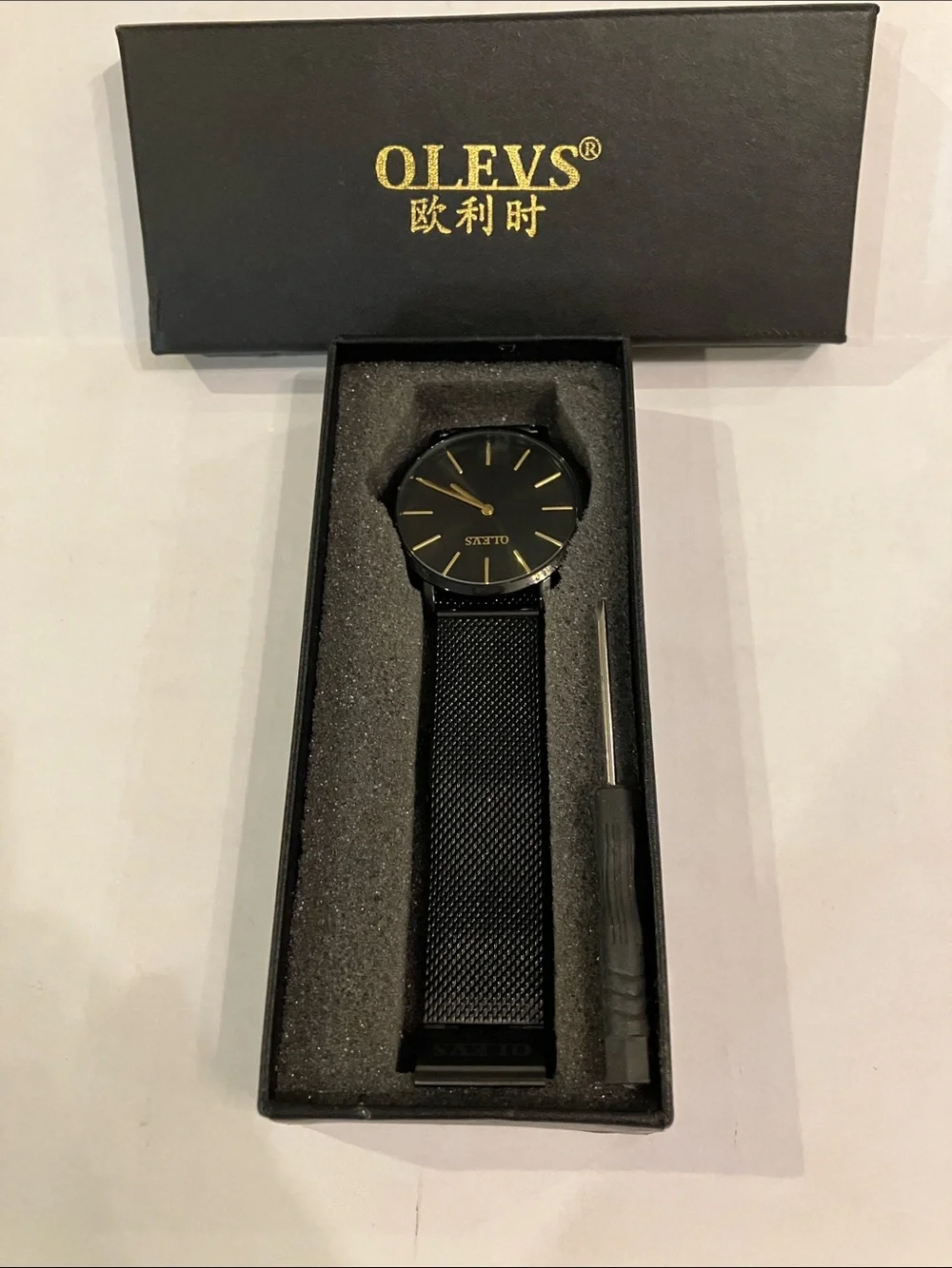 OLEVS  Men’s Analog Quartz Black Watch with gift box & screw driver.